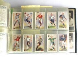 An album containing sets of cigarette cards (8 sets)