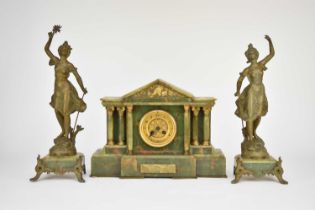 A French onyx and gilt metal clock garniture