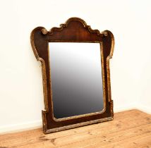 A 19th century gilt gesso and mahogany wall mirror