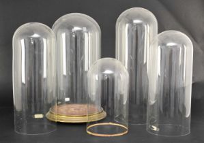 A collection of six glass domes