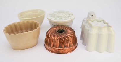A collection of jelly and blancmange moulds with a Grimwades 'Quick-Cooker' bowl