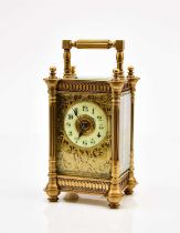 A French early 20th century brass carriage timepiece