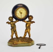 A French Louis XV style gilt metal figural timepiece