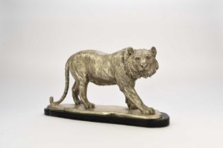A white metal plated cast resin figure of a tiger