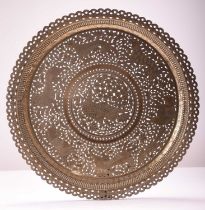 A pair of Indian incised and pierced brass trays or table tops