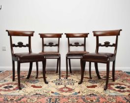 A set of four William IV rosewood dining chairs