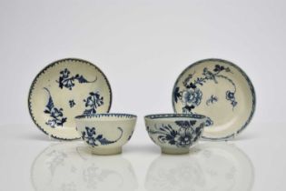 Two Liverpool porcelain tea bowls and saucers, 18th century
