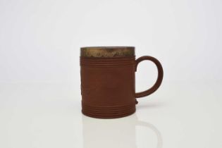 An Elers type red stoneware mug