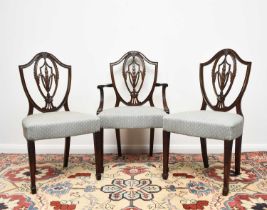 A set of ten mahogany dining chairs in the Hepplewhite style