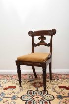 A set of seven William IV mahogany dining chairs