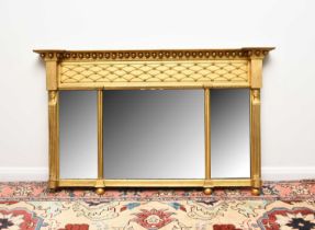 A 19th century Regency style three-glass overmantel mirror