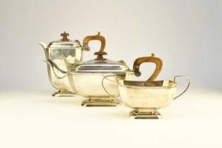 A three piece silver tea service