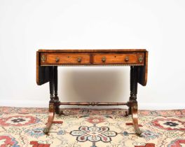 A Regency brass inlaid rosewood sofa table