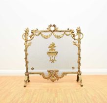 A Regency revival cast brass fire screen