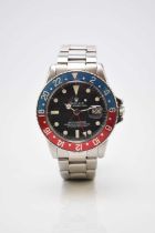 Rolex: A gentleman's stainless steel GMT Master automatic calendar dual-time bracelet watch Formerly