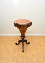 A Victorian rosewood and marquetry inlaid work table