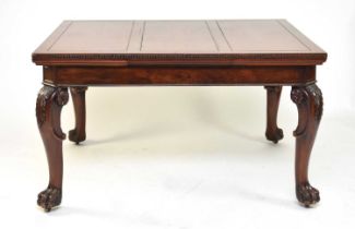 A mahogany draw-leaf dining table and set of six Chippendale style dining chairs