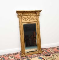 A Regency Revival giltwood pier type wall mirror