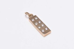 A 9ct gold diamond set ingot pendant