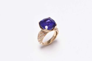 An 18ct gold tanzanite and diamond ring by Kat Florence
