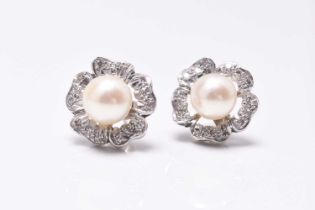 A pair of cultured pearl and diamond floral cluster earrings