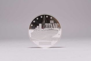 A cased silver medallion commemorating The Titanic