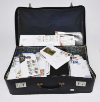 Massive collection of Royal Mail First Day and commemorative covers in two suitcases and large plast