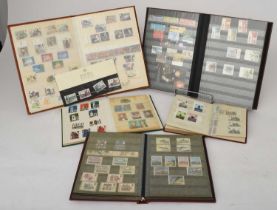 Great Britain collection of mint stamps in five stock books 1969-2002. Contains mint decimal commemo