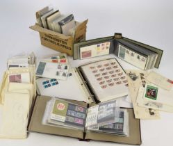 Two large cartons containing a massive accumulation of covers, stamps, FDCs etc.