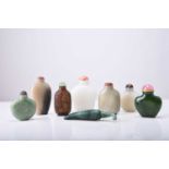 A group of eight Chinese jade and hardstone snuff bottles, 19th/20th century