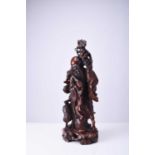 A Chinese carved hardwood figure of Shoulao