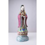 A Chinese famille rose figure of Guanyin, Qing Dynasty
