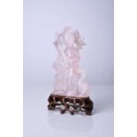 A Chinese rose quartz figure of Guanyin, Qing Dynasty, 19th century