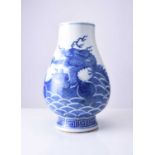A Chinese blue and white dragon vase, 19th century