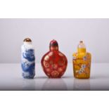 Three Chinese enamelled glass snuff bottles, 19th/20th century