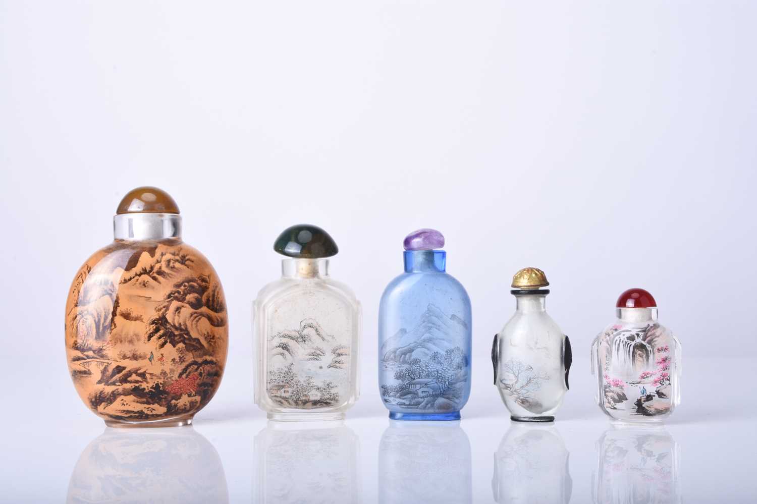 A group of five Chinese internally painted glass snuff bottles, 19th/20th century