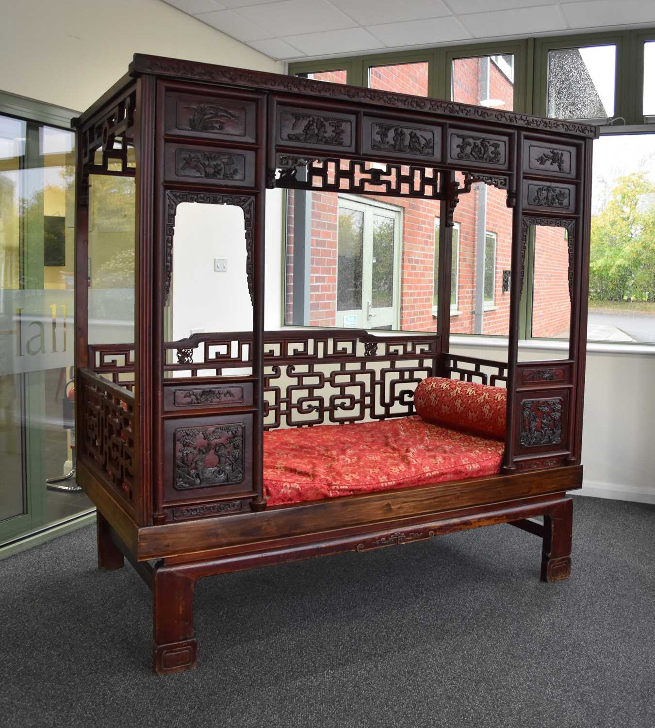 A Chinese carved hardwood opium bed, 20th century