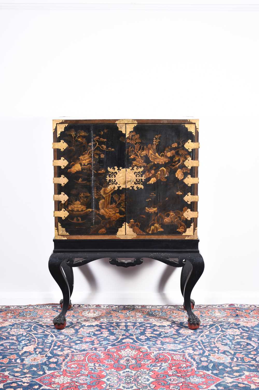 A Japanese lacquer cabinet on later stand, Meiji era