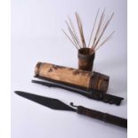 A South East Asian blow pipe spear with bamboo quiver of darts