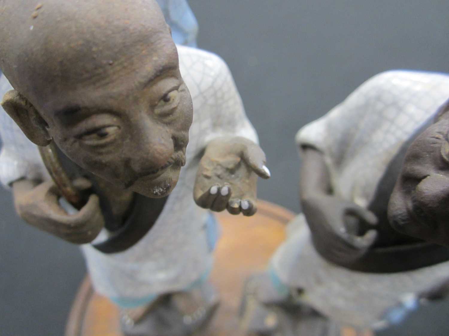 A Chinese pair of Shiwan 'mud' figures, 20th century - Image 4 of 5