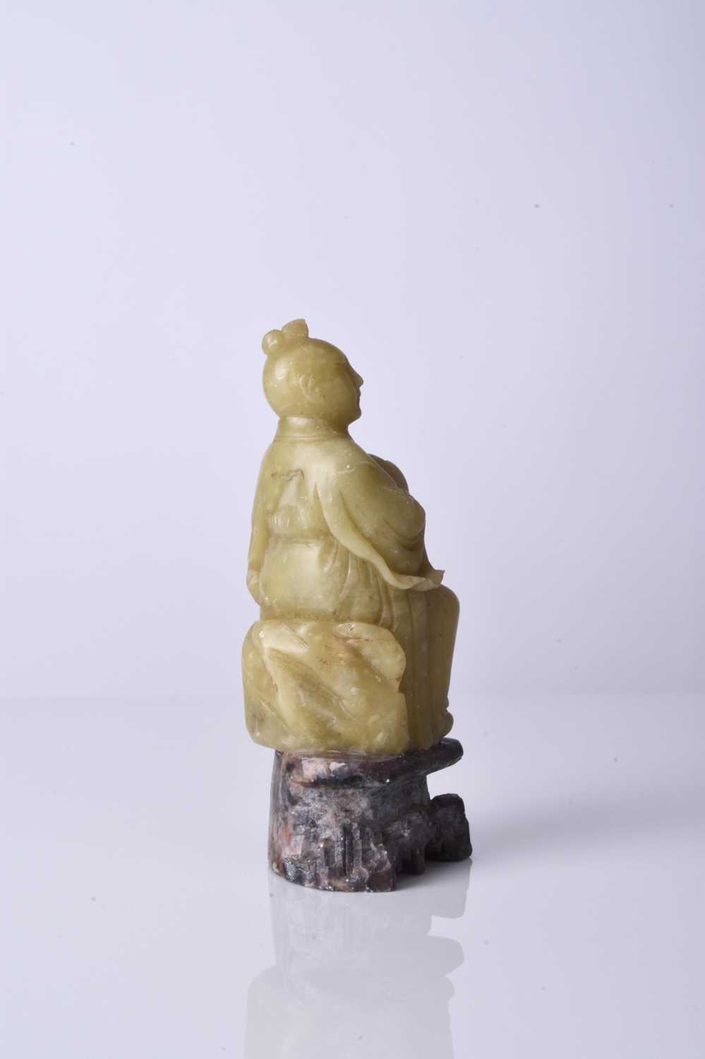 A Chinese carved soapstone figure of a luohan, 19th century - Image 2 of 2