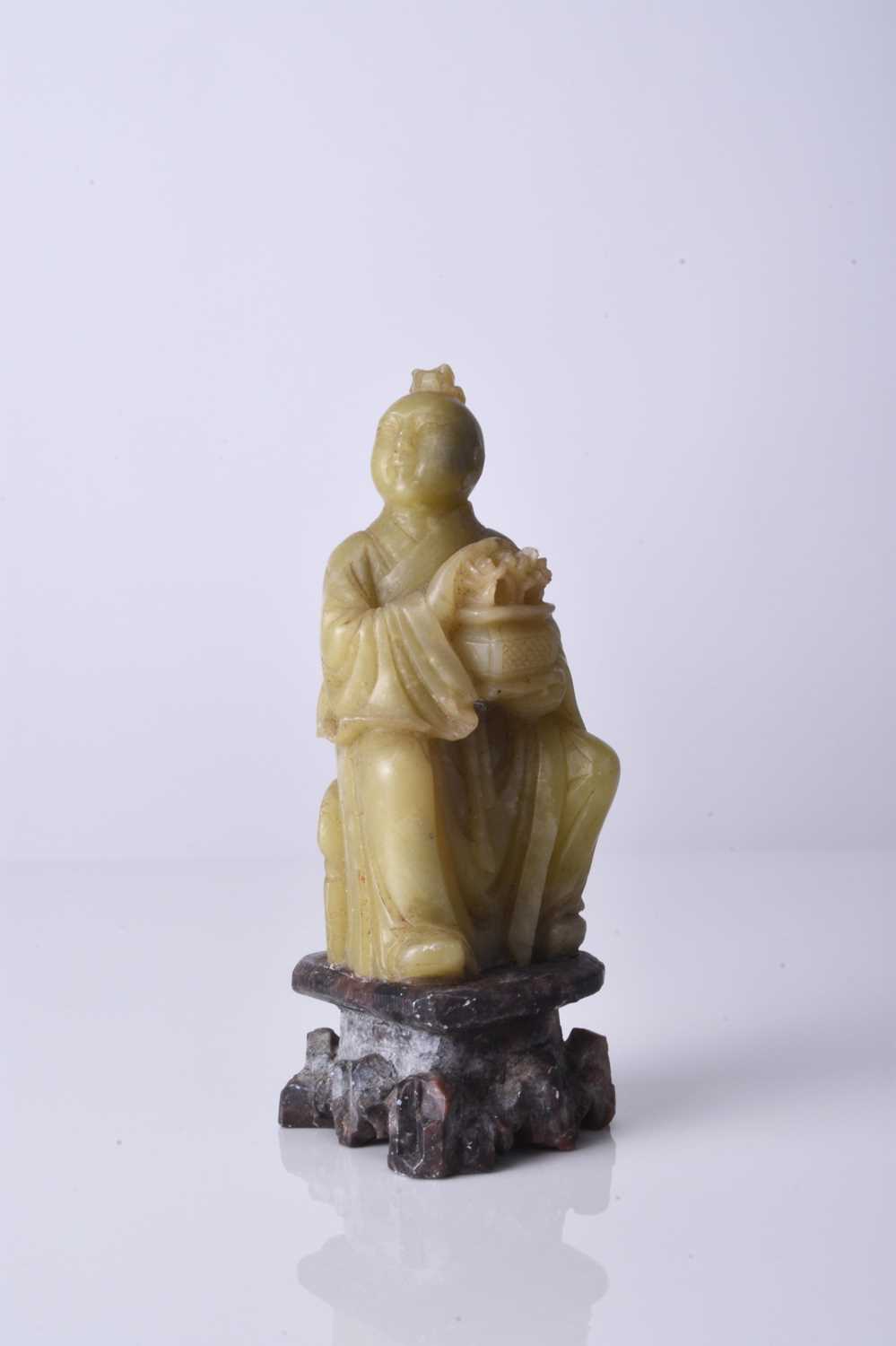 A Chinese carved soapstone figure of a luohan, 19th century