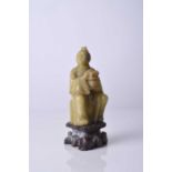 A Chinese carved soapstone figure of a luohan, 19th century