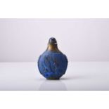 A Chinese carved lapis lazuli snuff bottle, 19th century