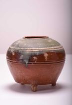 A glazed terracotta tripod jar, Han Dynasty