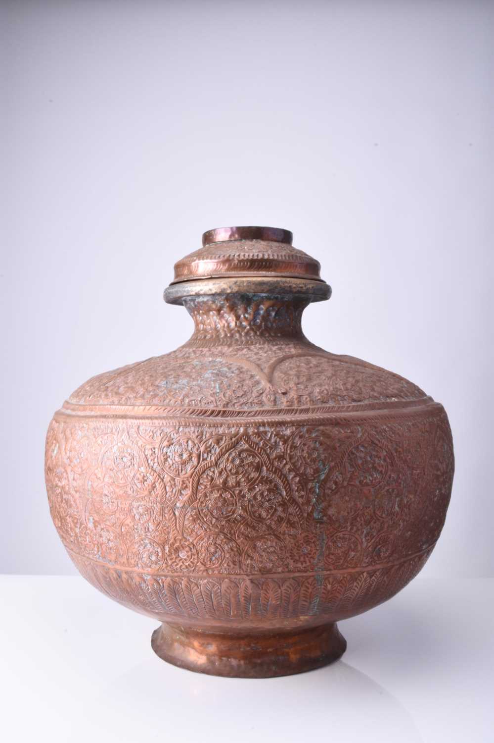An embossed copper vessel, Oman