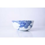 A Chinese 'Bleu de Hue' blue and white dragon bowl, 18th century