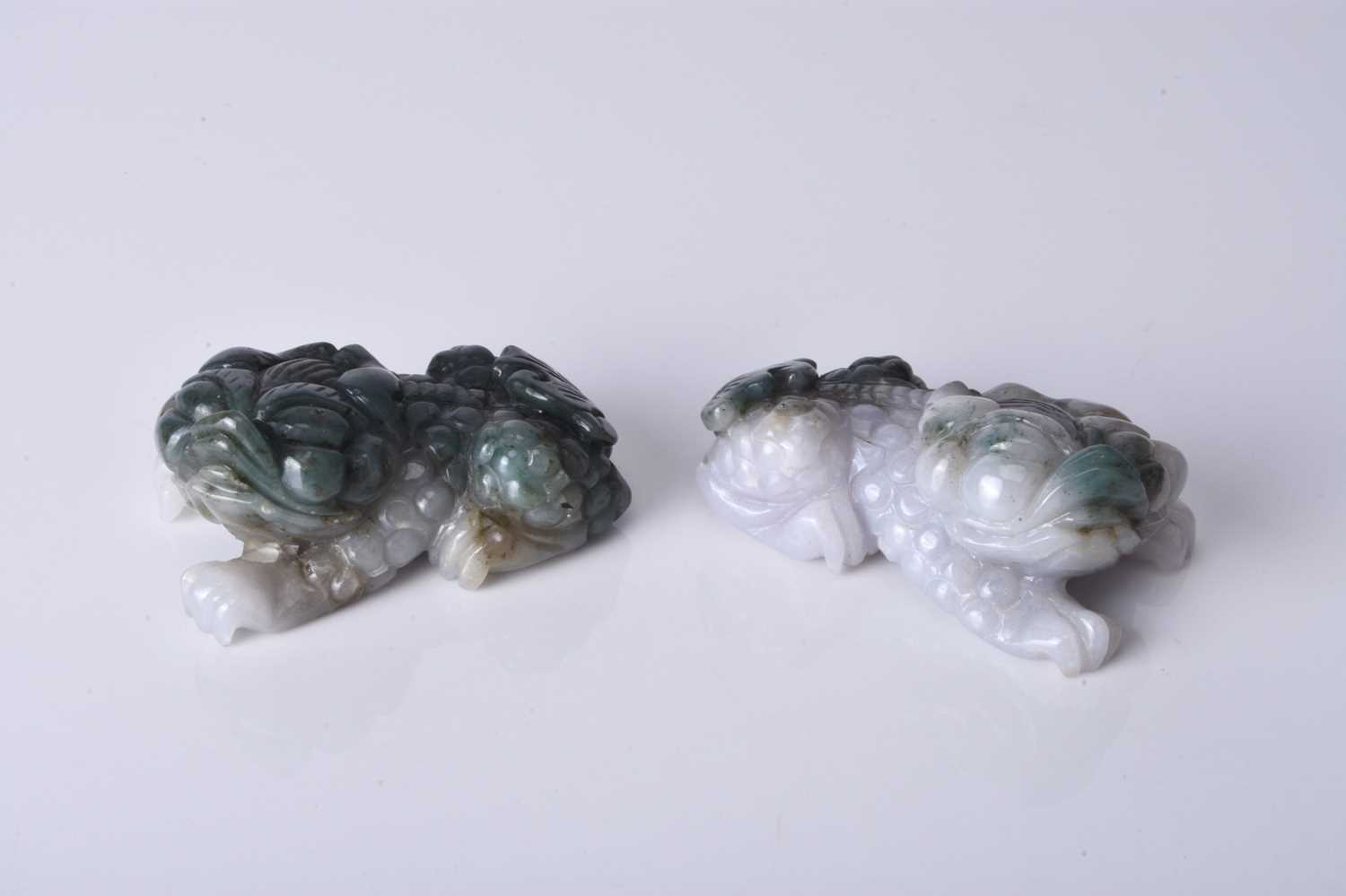 A pair of Chinese jadeite figures of lion dogs, 20th century - Image 2 of 3