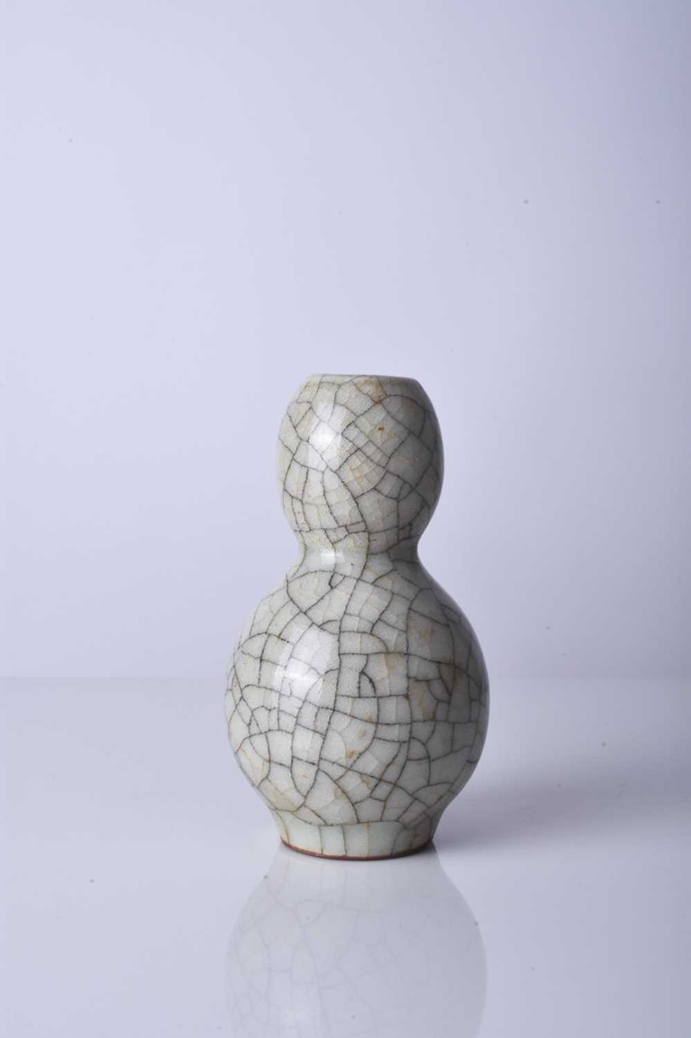 A Chinese Guan type gourd vase, Qing Dynasty