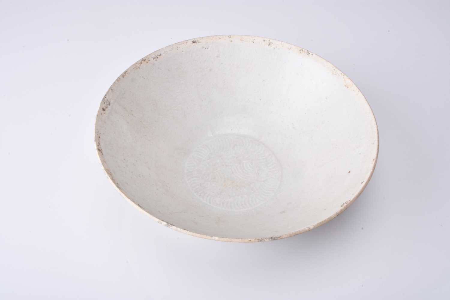 A Chinese Qingbai conical bowl, Song/Yuan Dynasty - Image 3 of 4